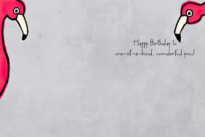Inside of a birthday card featuring pink flamingos and the message 'Happy Birthday to one-of-a-kind, wonderful you!'