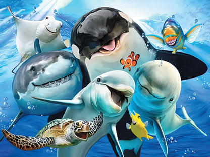 Front of a greeting card with a group of smiling cartoon ocean animals including a killer whale, shark, dolphins, clownfish, ray, and sea turtle.
