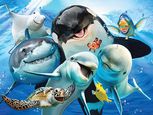 Front of a greeting card with a group of smiling cartoon ocean animals including a killer whale, shark, dolphins, clownfish, ray, and sea turtle.