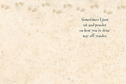 Inside of a greeting card with a thoughtful message, "Sometimes I just sit and ponder...", and subtle paw print design.