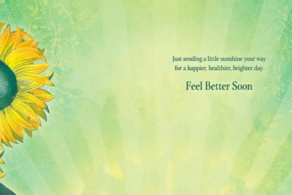 Inside of the 'SHINE' Get Well card, showing the encouraging message 'Feel Better Soon' with sunflower details and green rays.