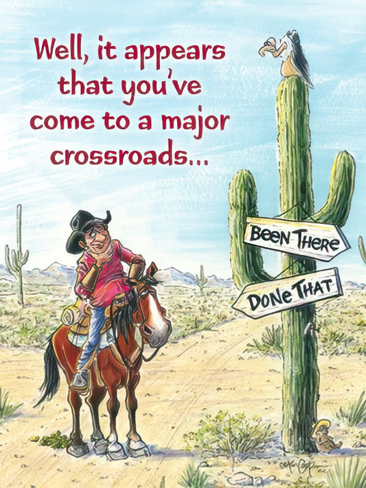 Front of a funny birthday card with a cartoon cowboy on a horse in a desert, facing a signpost saying 'Been There, Done That'.