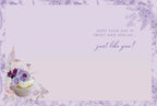 Inside of a heartfelt birthday card with the message 'HOPE YOUR DAY IS SWEET AND SPECIAL... just like you!' and a decorative single cupcake detail, framed by subtle lavender floral designs.
