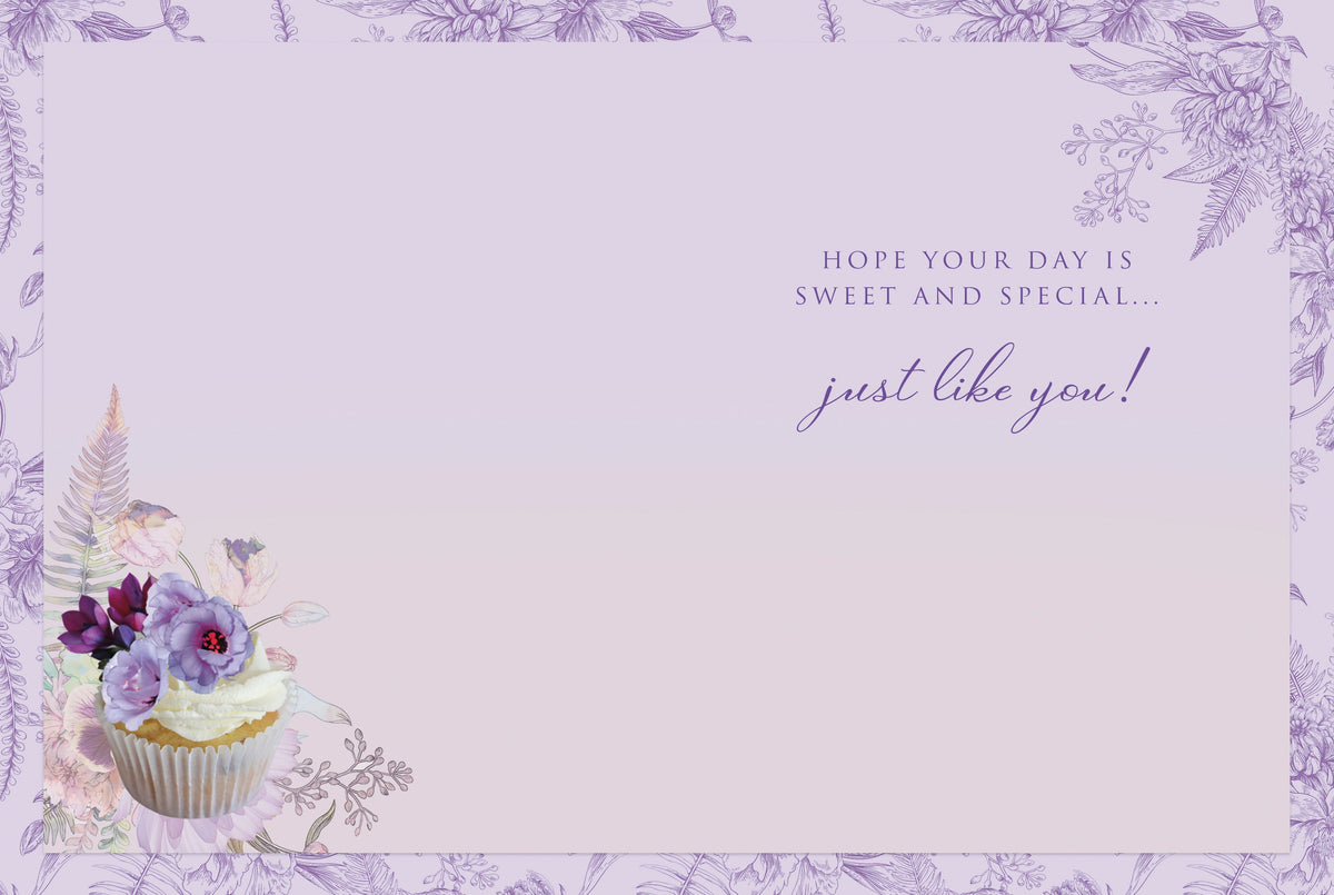 Inside of a heartfelt birthday card with the message 'HOPE YOUR DAY IS SWEET AND SPECIAL... just like you!' and a decorative single cupcake detail, framed by subtle lavender floral designs.