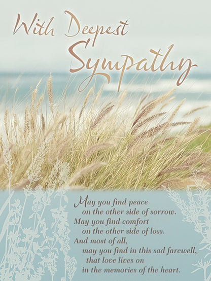 Front of a Deepest Sympathy card featuring elegant script 'With Deepest Sympathy' over a tranquil beach grass landscape.