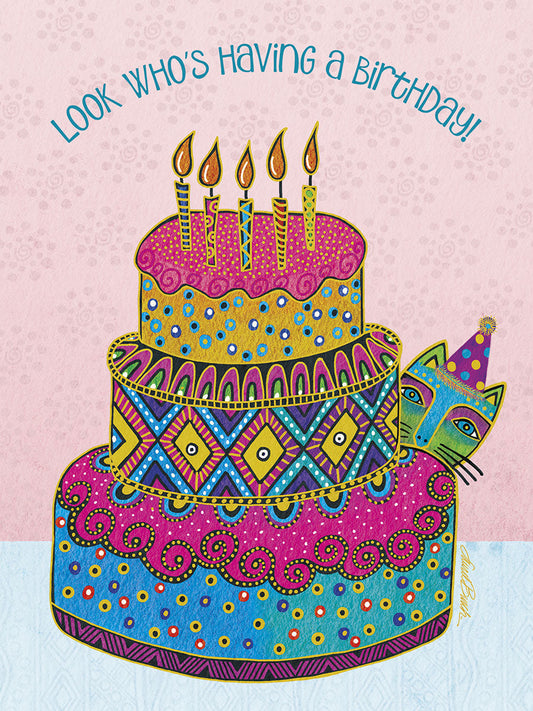 Front of a vibrant birthday card featuring a cute, stylized cat with a party hat peeking from behind a colorful, multi-tiered cake with lit candles.