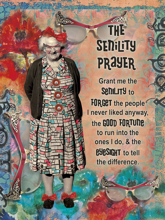 Front of a funny birthday card featuring an older woman with glasses, a red bow, and the text 'The Senility Prayer'.
