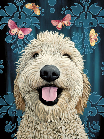 Front of greeting card featuring a smiling golden doodle with pink and orange butterflies on a dark blue damask pattern background.