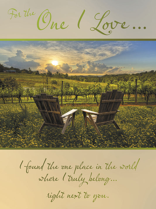 Front of romantic greeting card showing two Adirondack chairs in a vineyard at sunset with a heartfelt message.