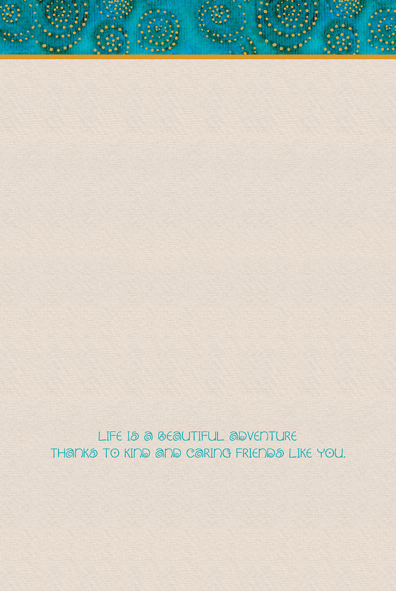 Inside view of a greeting card with a textured off-white background and a turquoise and gold patterned border at the top. The message reads: 'LIFE IS A BEAUTIFUL ADVENTURE THANKS TO KIND AND CARING FRIENDS LIKE YOU.'
