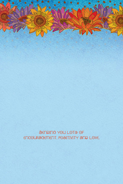 Light blue greeting card interior with 'Sending you lots of encouragement, positivity and love' text and colorful floral border.