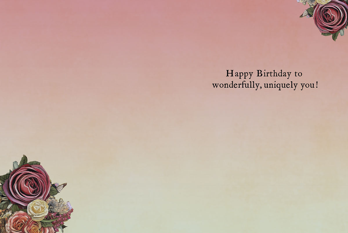 Open birthday card displaying 'Happy Birthday to wonderfully, uniquely you!' with floral accents.