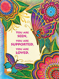 Vibrant greeting card front with two colorful butterflies, intricate gold-accented floral mandalas, and text 'YOU ARE SEEN, YOU ARE SUPPORTED, YOU ARE LOVED' for a heartfelt message.