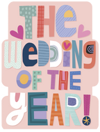 Front of a playful, colorful greeting card for a marriage celebration, featuring bold, patterned letters spelling 'THE WEDDING OF THE YEAR!' on a pale pink background with small heart accents.