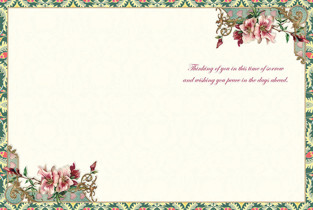 Inside of a thoughtful bereavement card showing a comforting message 'Thinking of you in this time of sorrow and wishing you peace in the days ahead' with matching floral corner designs.