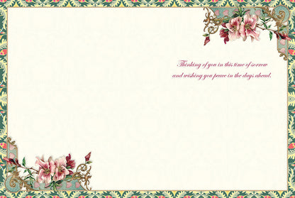 Inside of a Victorian sympathy card with delicate floral corners and a printed message of peace and comfort.