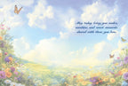 Inside of a serene birthday card with a light blue sky, gentle clouds, and a border of blooming wildflowers and butterflies, featuring the heartfelt message: 'May today bring you smiles, sunshine, and sweet moments shared with those you love.'