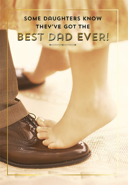 Fathers Day card showing a daughter's bare feet playfully resting on her father's dress shoe with 'SOME DAUGHTERS KNOW THEY'VE GOT THE BEST DAD EVER!' text.
