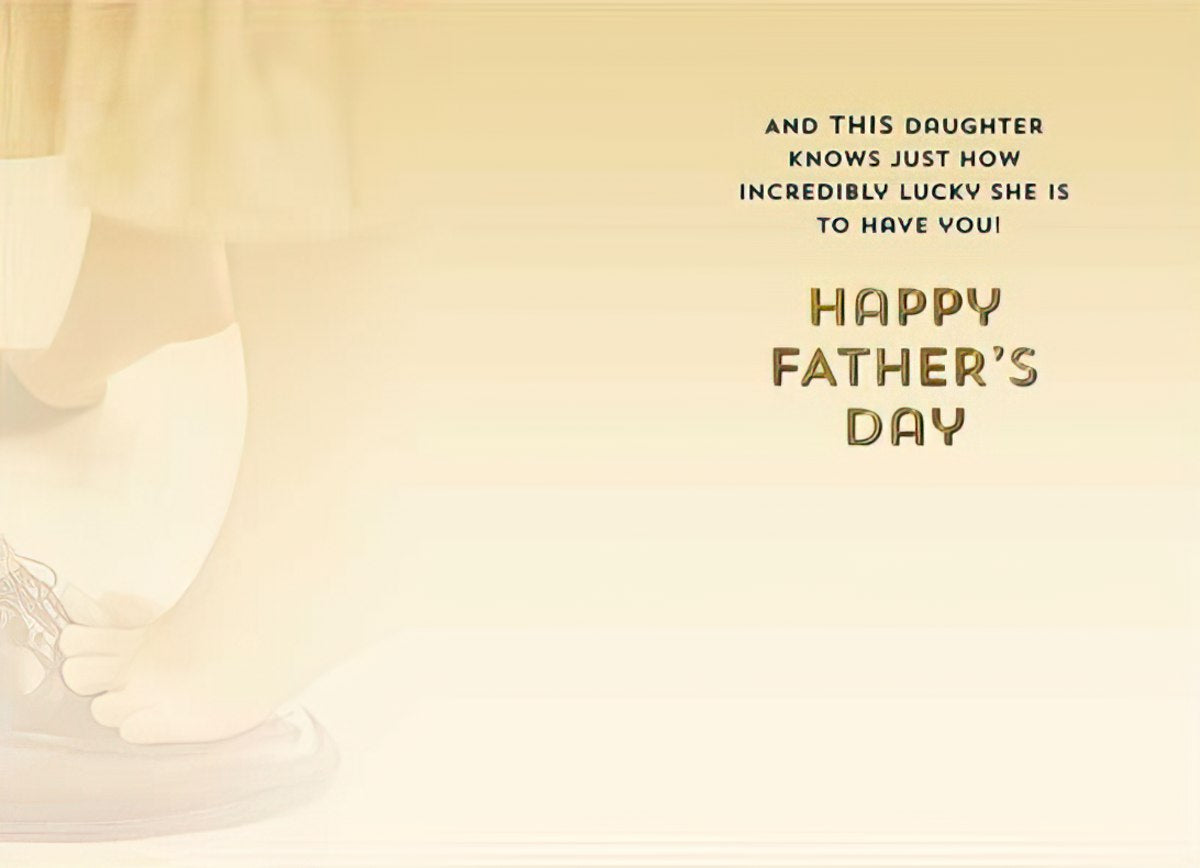 Inside of a Fathers Day card with text 'AND THIS DAUGHTER KNOWS JUST HOW INCREDIBLY LUCKY SHE IS TO HAVE YOU! HAPPY FATHER'S DAY' and faint feet image.