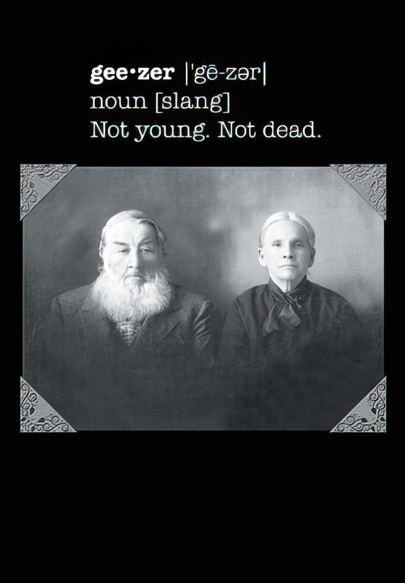 Maggie Mae card with vintage black and white photo of an older man and woman, definition of 'geezer', 'Not young. Not dead.'.