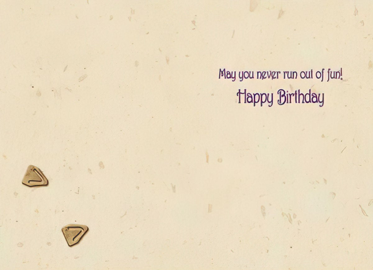 Inside of a Maggie Mae card with textured background and text 'May you never run out of fun! Happy Birthday'.