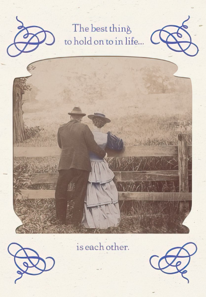 Maggie Mae card with vintage photo of a couple standing by a fence, text 'The best thing to hold on to in life...'.