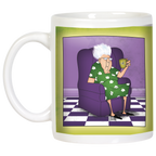 Angled view of the white ceramic mug, highlighting the cartoon of a sassy elderly woman in a purple armchair holding a cup. The mug has a prominent white handle and the character is set against a purple backdrop with a checkered floor, with a green border. This humorous mug is a great gift for her.