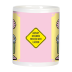 Back view of the funny ceramic mug, showcasing a yellow diamond caution sign with black text: 'ALREADY DISTURBED PROCEED WITH CAUTION' on a pink and yellow background.
