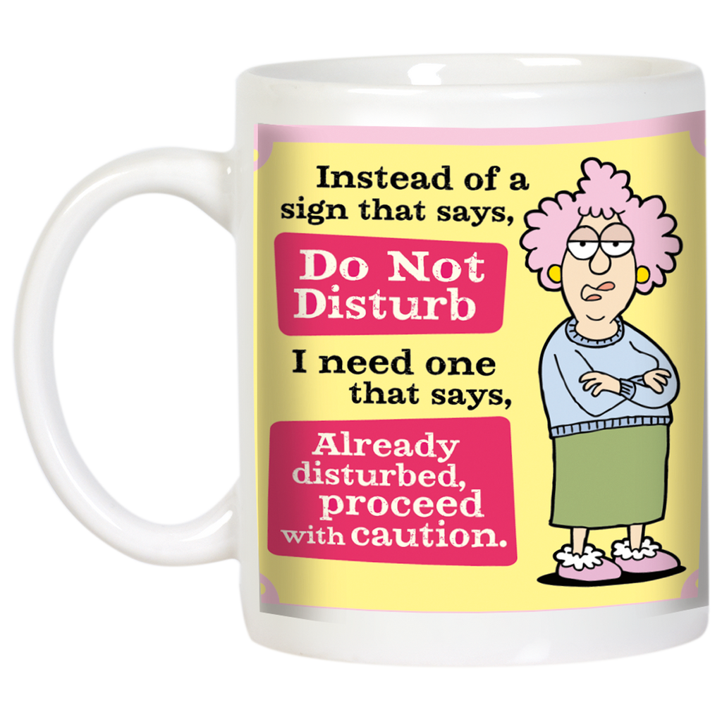 Frontal view of the humorous 'Already Disturbed' mug, highlighting the detailed illustration of the fed-up woman and the bold, witty text on a vibrant yellow and pink design, with the mug handle visible.