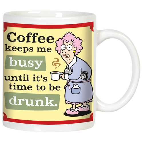Front view of a white ceramic coffee mug with a humorous cartoon illustration of an older woman in a bathrobe holding a steaming coffee cup. The text reads: 'Coffee keeps me busy until it's time to be drunk.' Perfect for funny gift ideas.