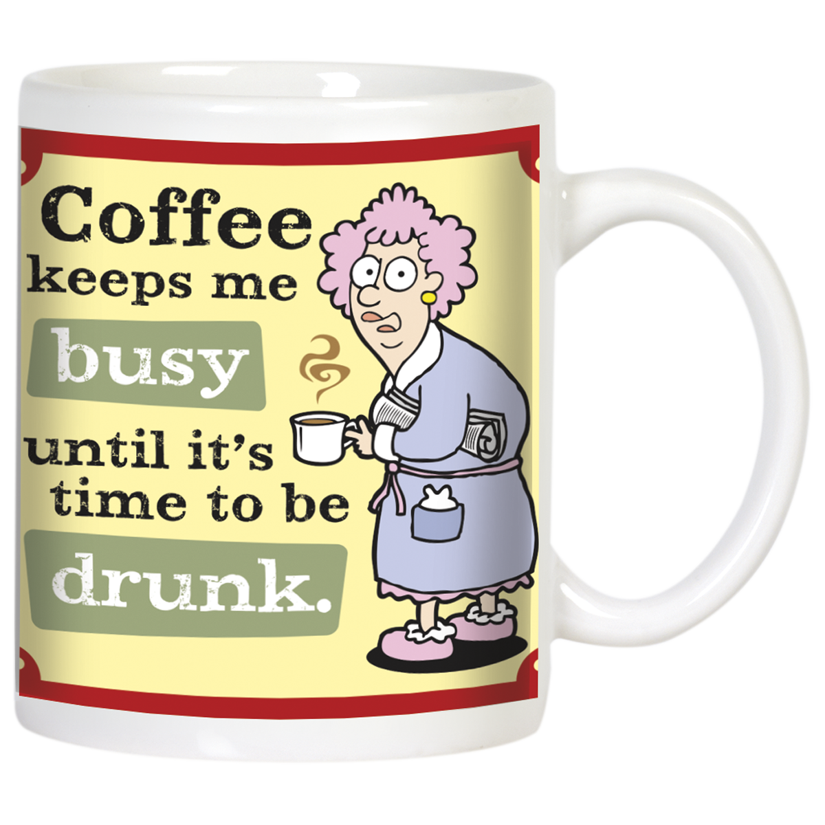 Front view of a white ceramic coffee mug featuring a funny cartoon of an older woman in a bathrobe with pink hair, holding a steaming coffee cup. Text reads: 'Coffee keeps me busy until it's time to be drunk.' on a yellow and green background.