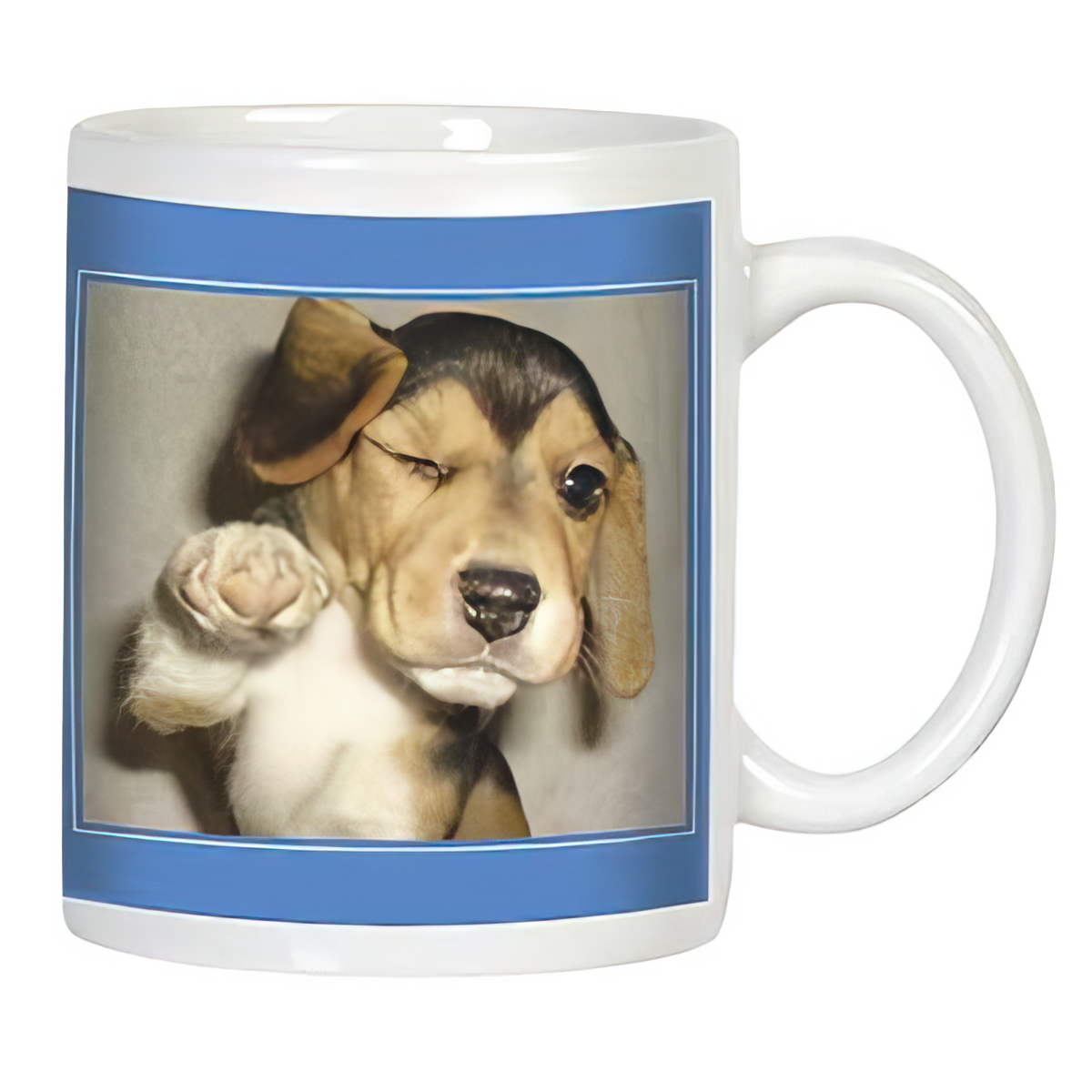 White ceramic coffee mug featuring a winking beagle puppy illustration on a blue background, perfect for dog lovers.