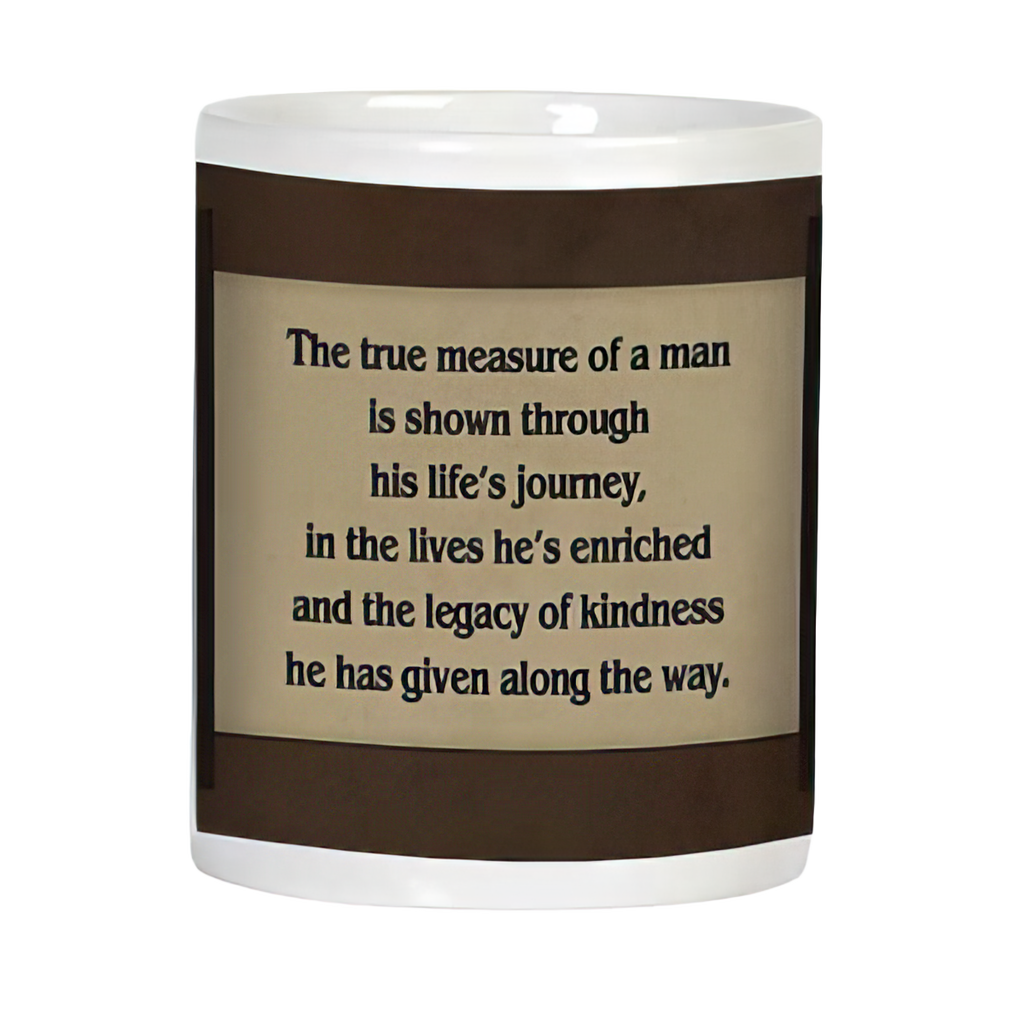 Back of an inspirational white coffee mug with the quote 'The true measure of a man is shown through his life's journey, in the lives he's enriched and the legacy of kindness he has given along the way,' on a light brown background.
