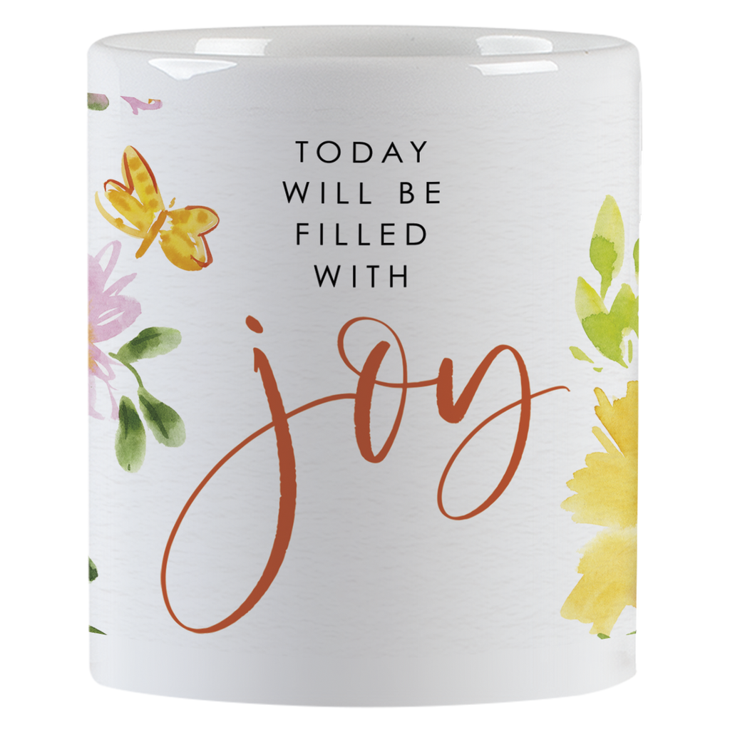 Close-up of a white ceramic mug showing the inspirational quote 'TODAY WILL BE FILLED WITH joy' in black and orange script, surrounded by watercolor flowers and a small yellow butterfly.