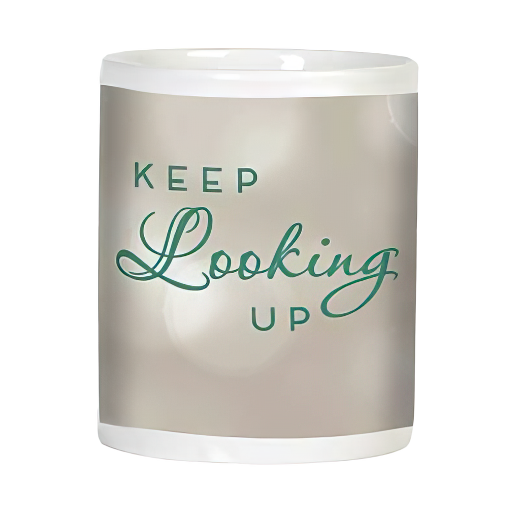 Side view of an inspirational white ceramic mug displaying 'KEEP Looking UP' in elegant green script on a subtle, bokeh-effect light grey background.