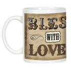 Elegant white mug displaying the message 'BLESS WITH LOVE' in a charming, old-world font, surrounded by decorative flourishes. A comforting and inspiring beverage holder.