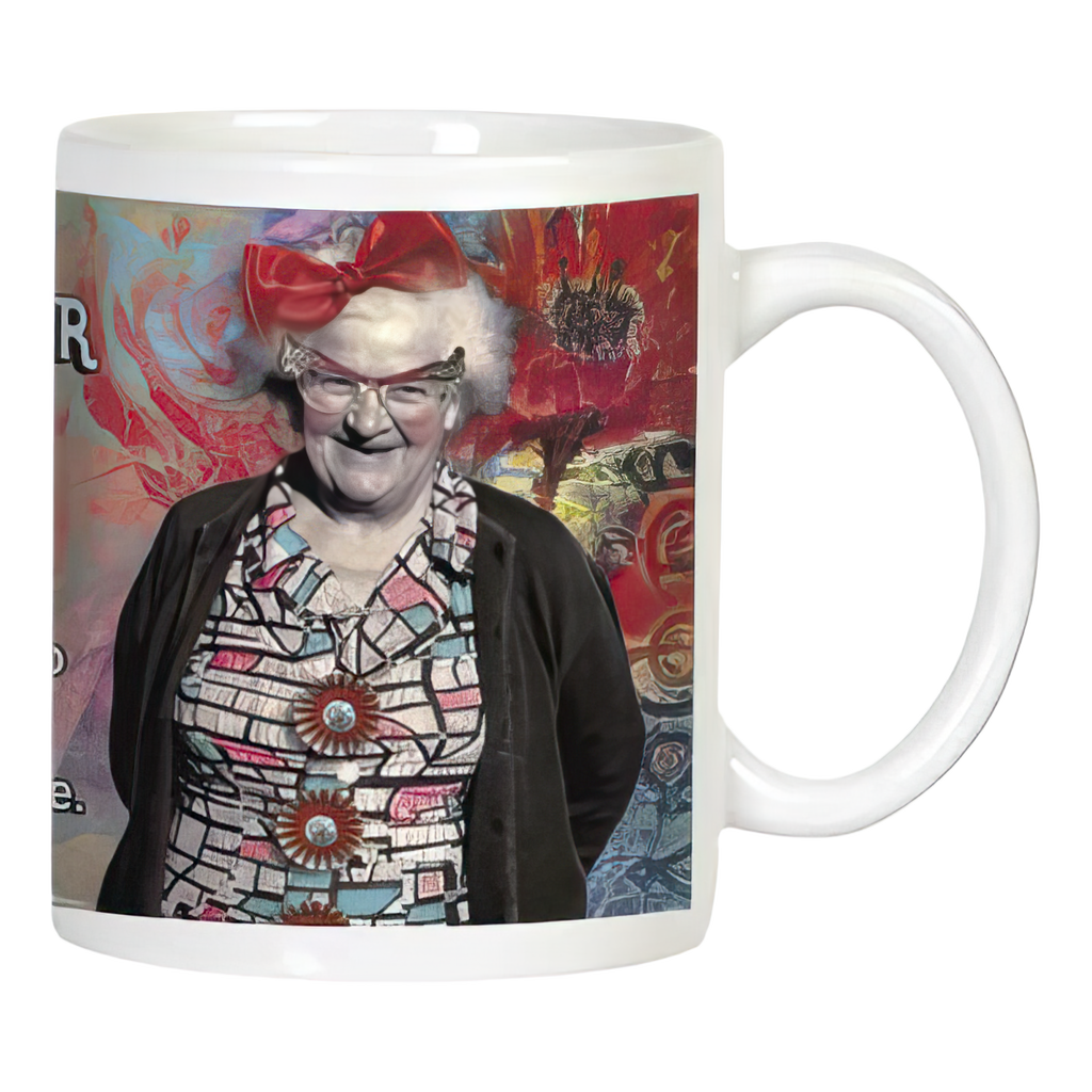 Funny white ceramic mug with an illustration of a smiling senior woman wearing glasses and a red bow, featuring 'THE SENILITY PRAYER' partially visible, perfect for grandparent humor.