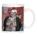 Funny white ceramic mug with an illustration of a smiling senior woman wearing glasses and a red bow, featuring 'THE SENILITY PRAYER' partially visible, perfect for grandparent humor.