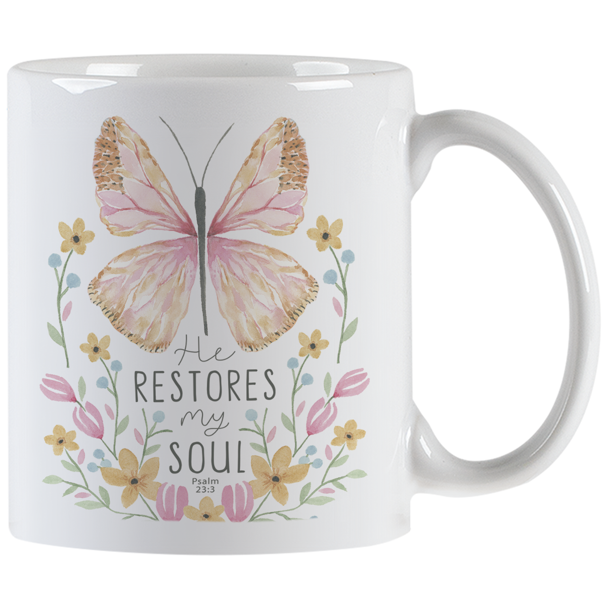 White ceramic coffee mug with a pastel watercolor butterfly and flowers design, featuring the scripture 'He restores my soul' from Psalm 23:3, perfect for Christian gifts and inspiring daily sips.