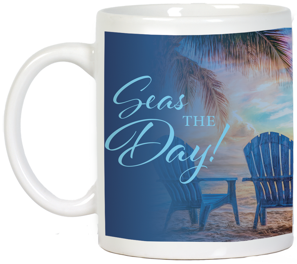 Side view of a white ceramic mug displaying 'Seas THE Day!' text prominently over a blue gradient. A peaceful beach landscape with a palm tree and blue Adirondack chair is visible in the background, promoting a relaxed mood.