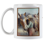 Full view of a white ceramic coffee mug with a handle, showcasing a framed watercolor-style illustration of a cowgirl affectionately petting her horse, perfect for equestrian enthusiasts.