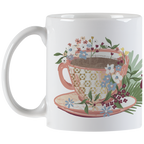 Decorative ceramic mug with a vibrant floral teacup illustration and comfortable handle, ideal for hot beverages and positive vibes.
