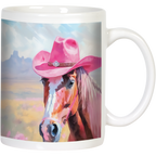 Front view of a white ceramic mug featuring a brown horse wearing a vibrant pink cowboy hat, set against a watercolor-style desert landscape with mountains.