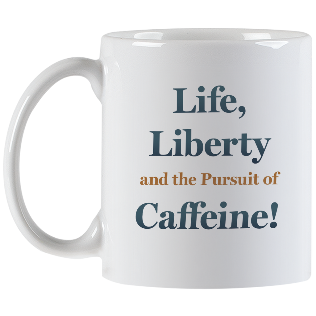 Back of the white ceramic mug featuring the humorous quote 'Life, Liberty and the Pursuit of Caffeine!' in dark blue and brown text.