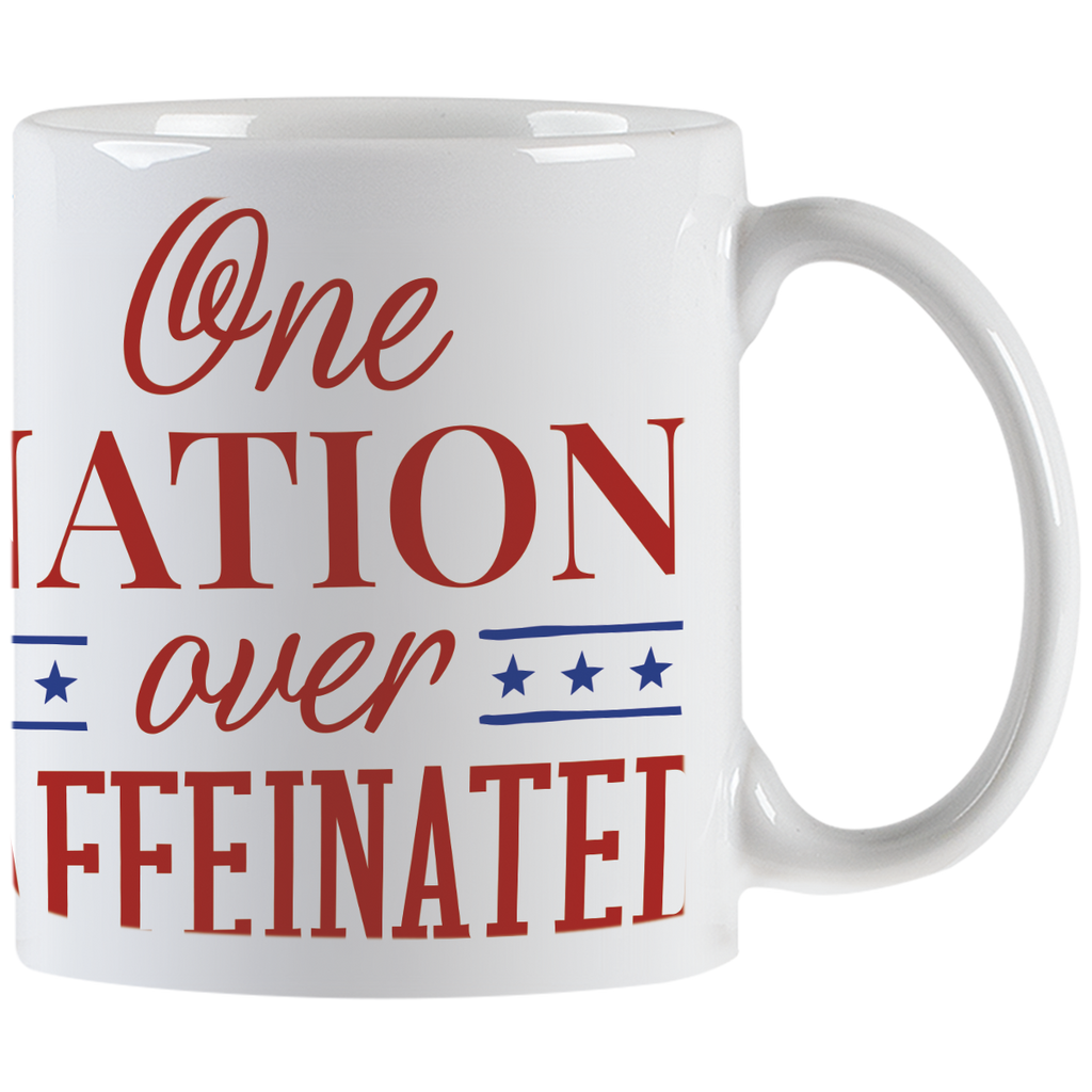 Close-up of white ceramic coffee mug displaying red 'One NATION over CAFFEINATED' text with blue star accents, perfect for coffee lovers and daily use.