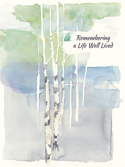 Watercolor aspen trees with green and blue background and text 'Remembering a Life Well Lived' on the front of a sympathy card.