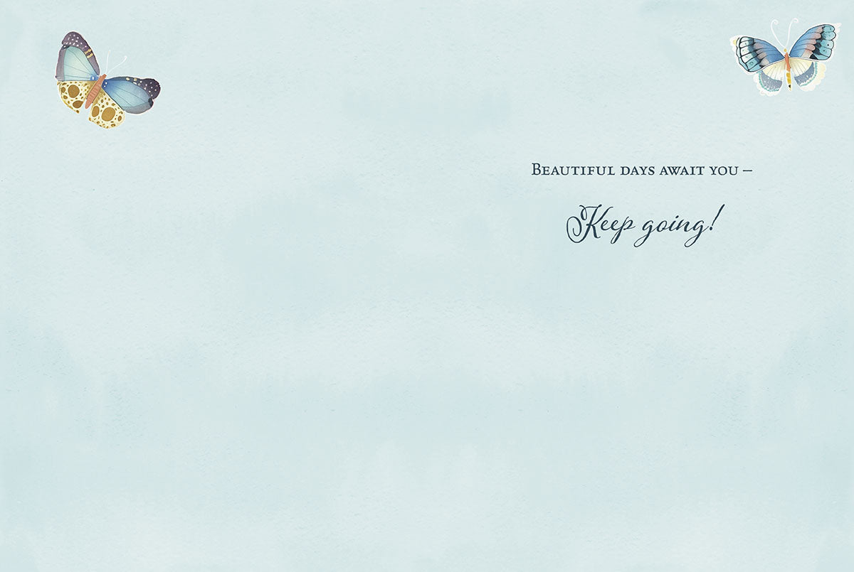 Interior of an encouragement greeting card with 'Beautiful days await you - Keep going!' message on a serene light blue watercolor wash.