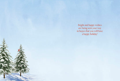 Inside of a holiday greeting card with 'Bright and happy wishes' message, snow, and evergreen trees.