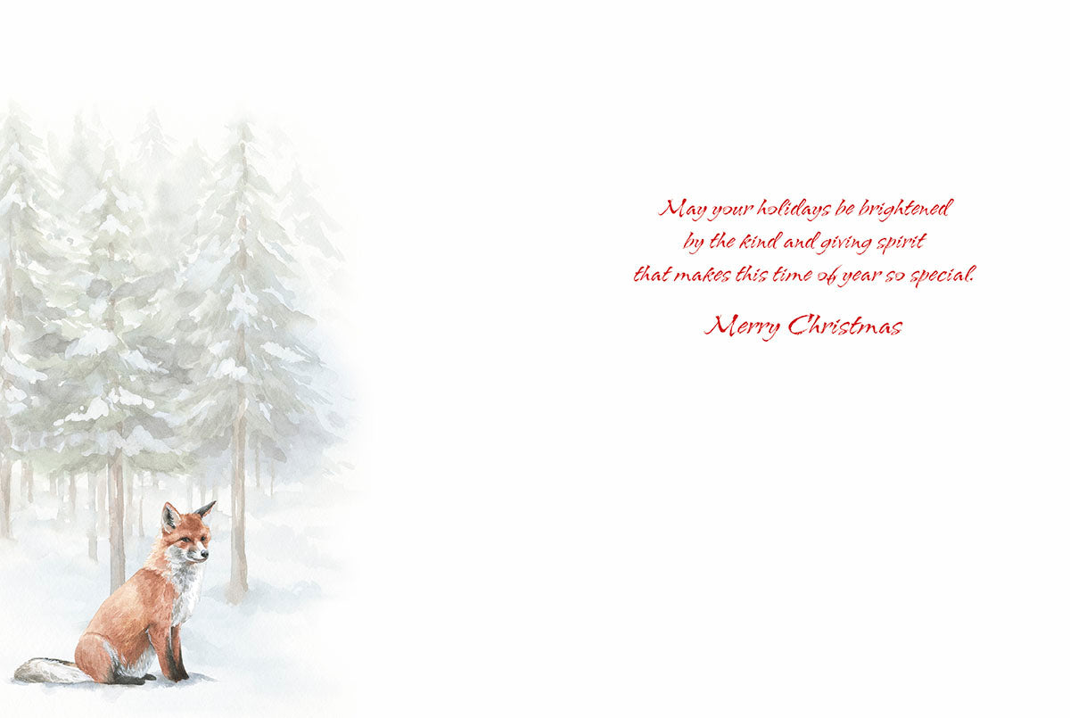 The inside of a greeting card with a red fox in a snowy forest on the left and a 'Merry Christmas' message on the right.