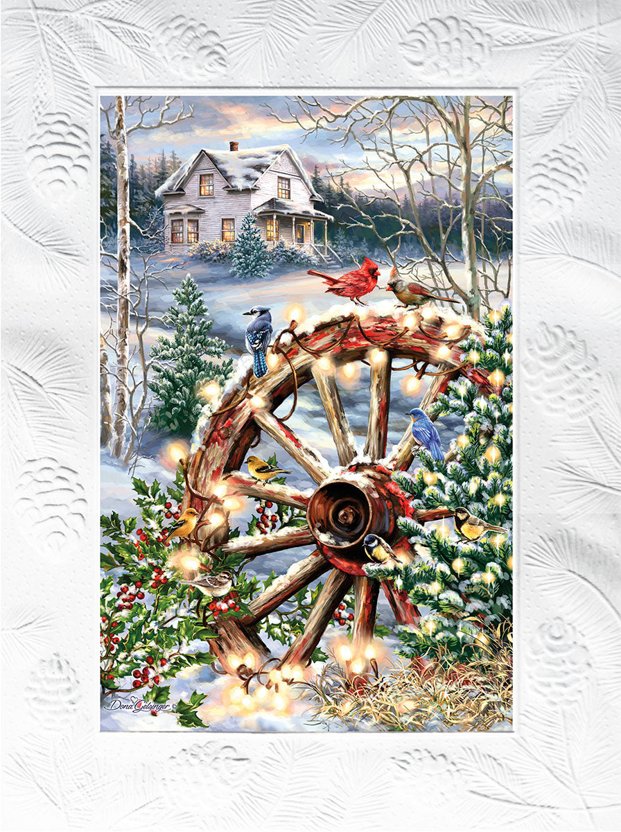 A beautiful winter scene with a wagon wheel decorated with Christmas lights, birds, and a snow-covered farmhouse in the background.